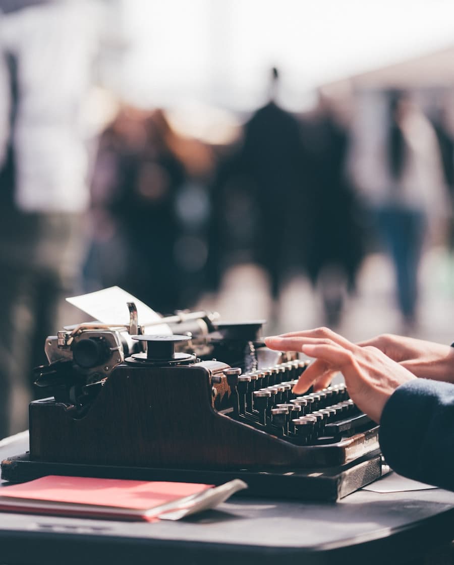 A writer at work on a typewriter